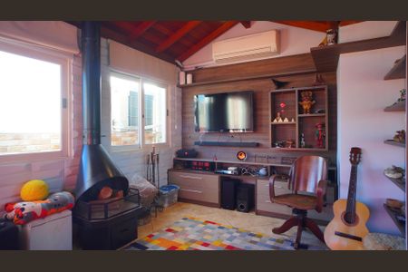 Apartamento à venda com 215m², 2 quartos e 2 vagas Apartamento à venda com 215m², 2 quartos e 2 vagasSala e lareira segundo piso