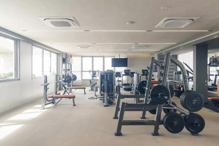 Studio à venda com 33m², 1 quarto e sem vaga Studio à venda com 33m², 1 quarto e sem vagaGinásio com equipamentos de treino e iluminação adequada.