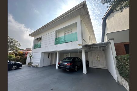 Casa de condomínio para alugar com 348m², 4 quartos e 6 vagasFachada