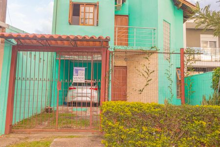 Casa à venda com 86m², 3 quartos e 2 vagasFachada/Placa