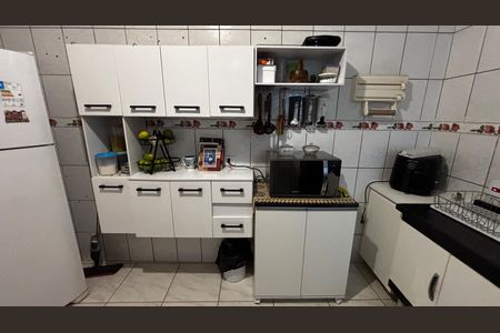 Casa à venda com 128m², 3 quartos e 2 vagas Casa à venda com 128m², 3 quartos e 2 vagasCozinha
