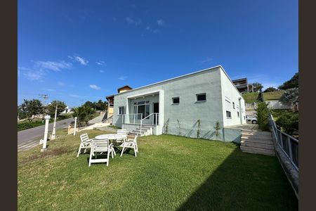 Casa de condomínio para alugar com 360m², 5 quartos e 4 vagasFachada