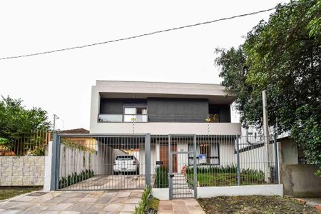 Casa à venda com 132m², 3 quartos e 2 vagas Casa à venda com 132m², 3 quartos e 2 vagasFachada