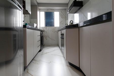 Apartamento à venda com 48m², 2 quartos e 1 vaga Apartamento à venda com 48m², 2 quartos e 1 vagaCozinha e Área de Serviço