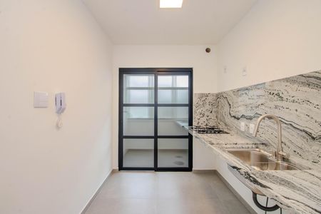 Apartamento à venda com 66m², 2 quartos e 1 vaga Apartamento à venda com 66m², 2 quartos e 1 vagaCozinha e Área de Serviço