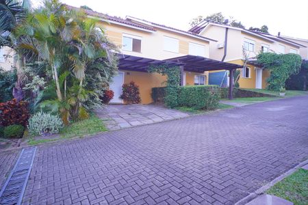 Casa de condomínio à venda com 118m², 3 quartos e 2 vagas Casa de condomínio à venda com 118m², 3 quartos e 2 vagasFachada