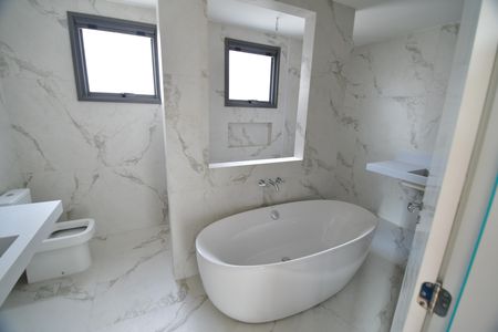 Casa de condomínio à venda com 312m², 5 quartos e 4 vagasBanheiro Suíte
