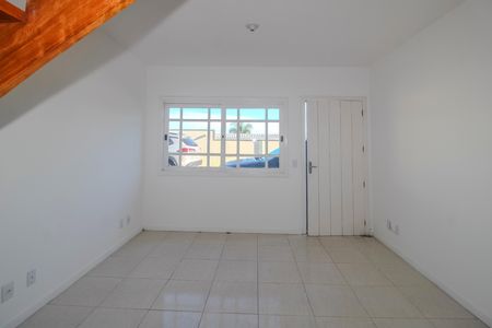 Sala de casa de condomínio à venda com 2 quartos, 99m² em Campo Novo, Porto Alegre