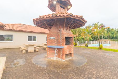 Casa de condomínio para alugar com 60m², 2 quartos e 2 vagas Casa de condomínio para alugar com 60m², 2 quartos e 2 vagasÁrea comum - Churrasqueira