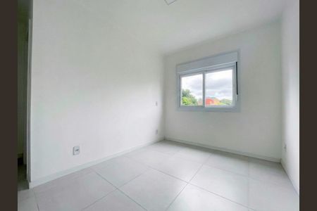Quarto 1 de apartamento para alugar com 2 quartos, 79m² em Santa Maria Goretti, Porto Alegre