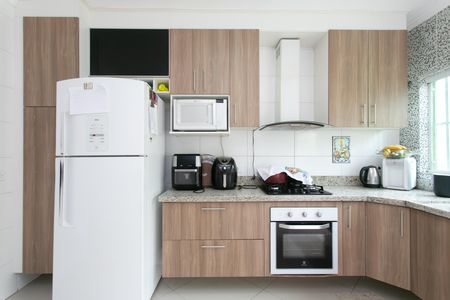 Casa à venda com 100m², 3 quartos e 2 vagas Casa à venda com 100m², 3 quartos e 2 vagasCozinha - Armários