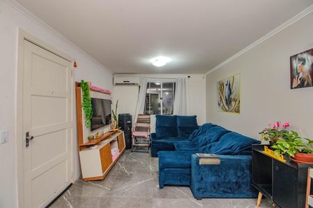 Sala de casa de condomínio à venda com 3 quartos, 86m² em Jardim Itu, Porto Alegre