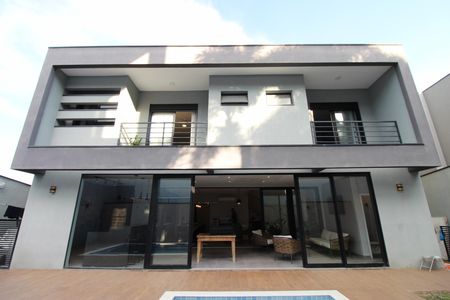 Casa de condomínio para alugar com 376m², 5 quartos e 4 vagasPiscina Fachada