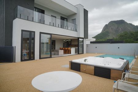 Casa de condomínio para alugar com 442m², 6 quartos e 3 vagasÁrea externa