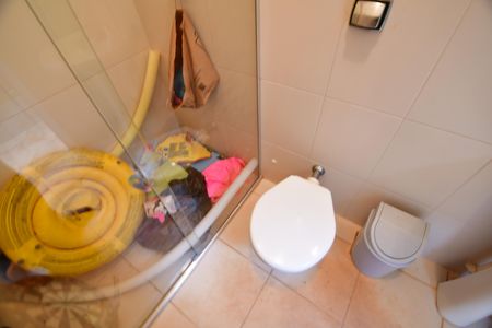 Casa de condomínio para alugar com 280m², 4 quartos e 4 vagasBanheiro de serviço