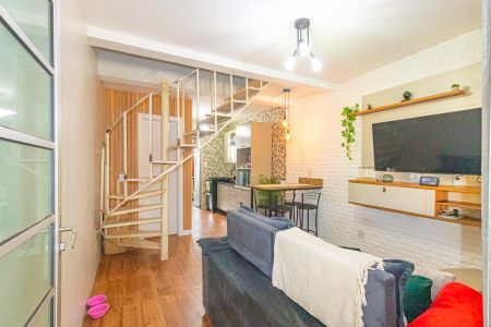 Sala de casa de condomínio à venda com 2 quartos, 45m² em Rio Branco, Canoas