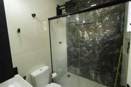 Casa à venda com 62m², 2 quartos e 2 vagasBanheiro da Suíte 1