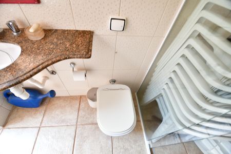 Casa à venda com 310m², 4 quartos e 4 vagasBanheiro de serviço