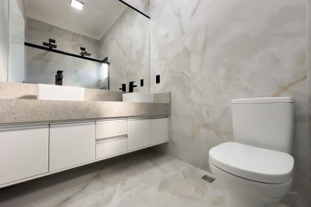 Casa de condomínio à venda com 226m², 3 quartos e 4 vagasSuíte 1