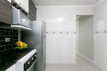 Casa à venda com 75m², 2 quartos e 2 vagas Casa à venda com 75m², 2 quartos e 2 vagasCozinha