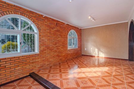 Sala de casa à venda com 3 quartos, 204m² em Santa Maria Goretti, Porto Alegre
