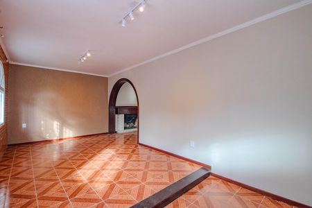 Sala de casa à venda com 3 quartos, 204m² em Santa Maria Goretti, Porto Alegre