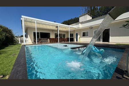 Casa de condomínio à venda com 516m², 4 quartos e 4 vagas