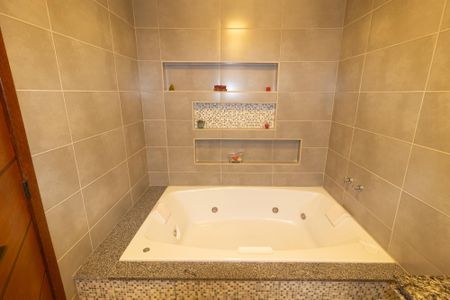 Casa de condomínio à venda com 250m², 3 quartos e 3 vagas Casa de condomínio à venda com 250m², 3 quartos e 3 vagasBanheiro da Suíte 1