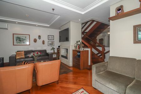 Sala de casa de condomínio à venda com 3 quartos, 234m² em Boa Vista, Porto Alegre
