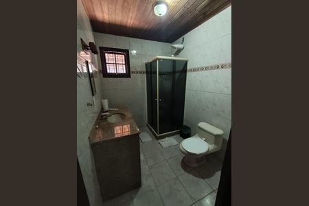 Casa de condomínio para alugar com 214m², 4 quartos e 4 vagasBanheiro