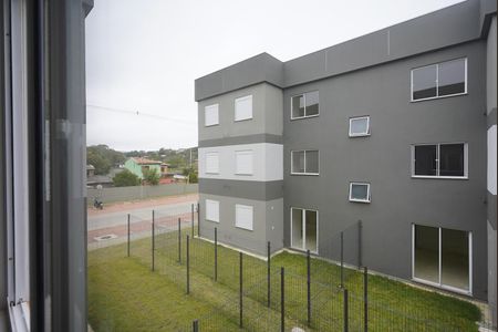 Sala - Vista de apartamento para alugar com 2 quartos, 49m² em Guarujá, Porto Alegre