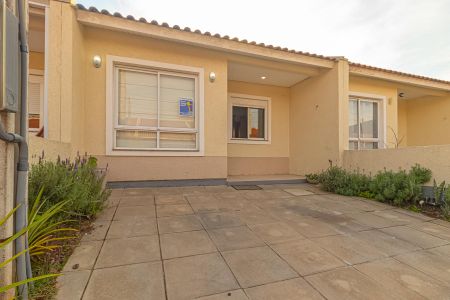 Casa de condomínio para alugar com 67m², 2 quartos e 2 vagas Casa de condomínio para alugar com 67m², 2 quartos e 2 vagasFachada/placa