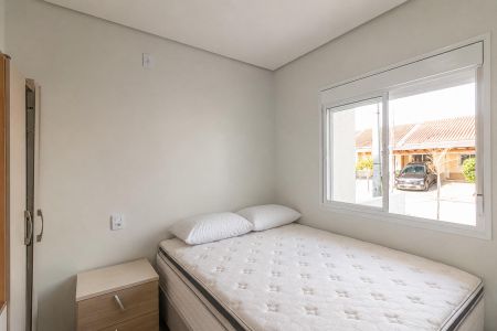Quarto 1 de casa de condomínio para alugar com 2 quartos, 67m² em Distrito Industrial, Cachoeirinha