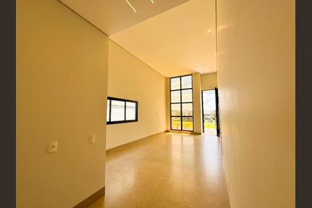 Sala de casa de condomínio para alugar com 3 quartos, 217m² em Gávea, Uberlândia