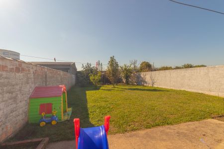 Quintal de casa à venda com 2 quartos, 57m² em Harmonia, Canoas