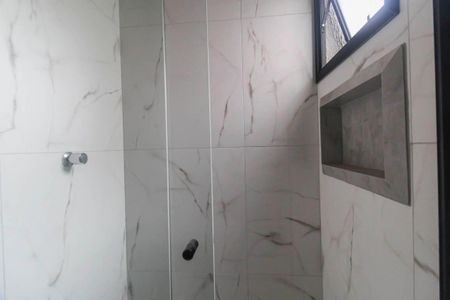 Casa de condomínio para alugar com 70m², 2 quartos e 1 vaga Casa de condomínio para alugar com 70m², 2 quartos e 1 vagaBanheiro da Suíte 2