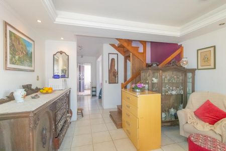 Sala de casa de condomínio à venda com 3 quartos, 89m² em Rio Branco, Canoas