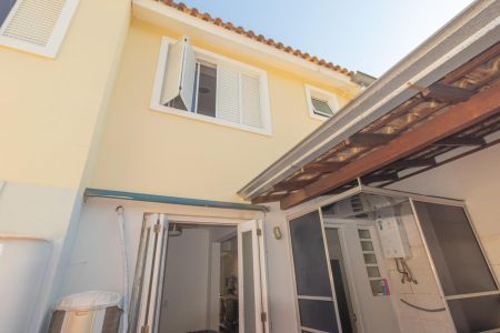Casa de condomínio à venda com 89m², 3 quartos e 2 vagas Casa de condomínio à venda com 89m², 3 quartos e 2 vagasFachada Posterior