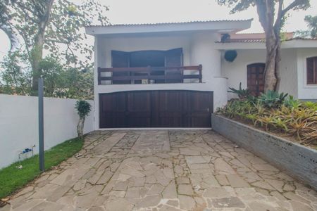 Fachada de casa à venda com 5 quartos, 409m² em Ipanema, Porto Alegre