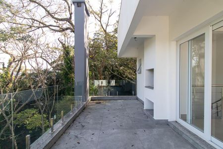 Casa de condomínio para alugar com 300m², 3 quartos e 4 vagas Casa de condomínio para alugar com 300m², 3 quartos e 4 vagasVaranda da Sala 2