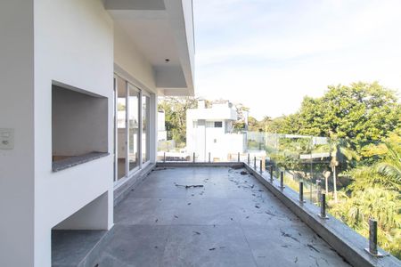 Casa de condomínio para alugar com 300m², 3 quartos e 4 vagas Casa de condomínio para alugar com 300m², 3 quartos e 4 vagasVaranda da Sala 2