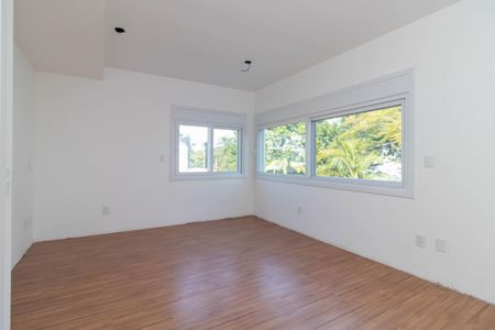 Quarto 1 de casa de condomínio para alugar com 3 quartos, 300m² em Pedra Redonda, Porto Alegre