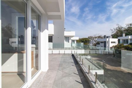 Casa de condomínio para alugar com 300m², 3 quartos e 2 vagas Casa de condomínio para alugar com 300m², 3 quartos e 2 vagasVaranda da Sala 2