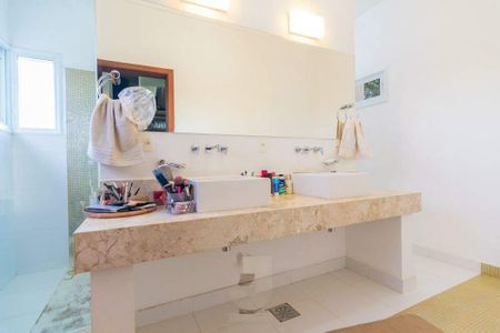 Casa de condomínio à venda com 472m², 4 quartos e 3 vagas