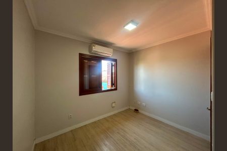 Quarto 1 de casa de condomínio à venda com 3 quartos, 117m² em Igara, Canoas