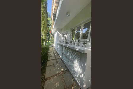Casa de condomínio para alugar com 400m², 4 quartos e 4 vagasÁrea Externa