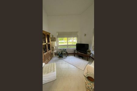 Casa de condomínio para alugar com 400m², 4 quartos e 4 vagasSala