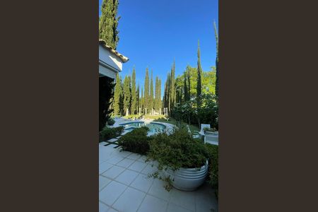 Casa de condomínio para alugar com 400m², 4 quartos e 4 vagasÁrea Externa