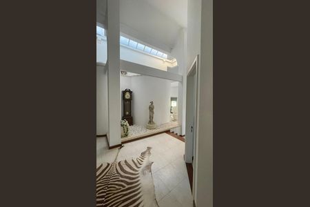 Casa de condomínio para alugar com 400m², 4 quartos e 4 vagasSala