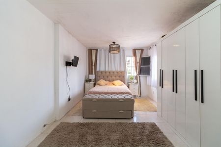Casa à venda com 126m², 2 quartos e 2 vagas Casa à venda com 126m², 2 quartos e 2 vagasQuarto 2 - Suíte